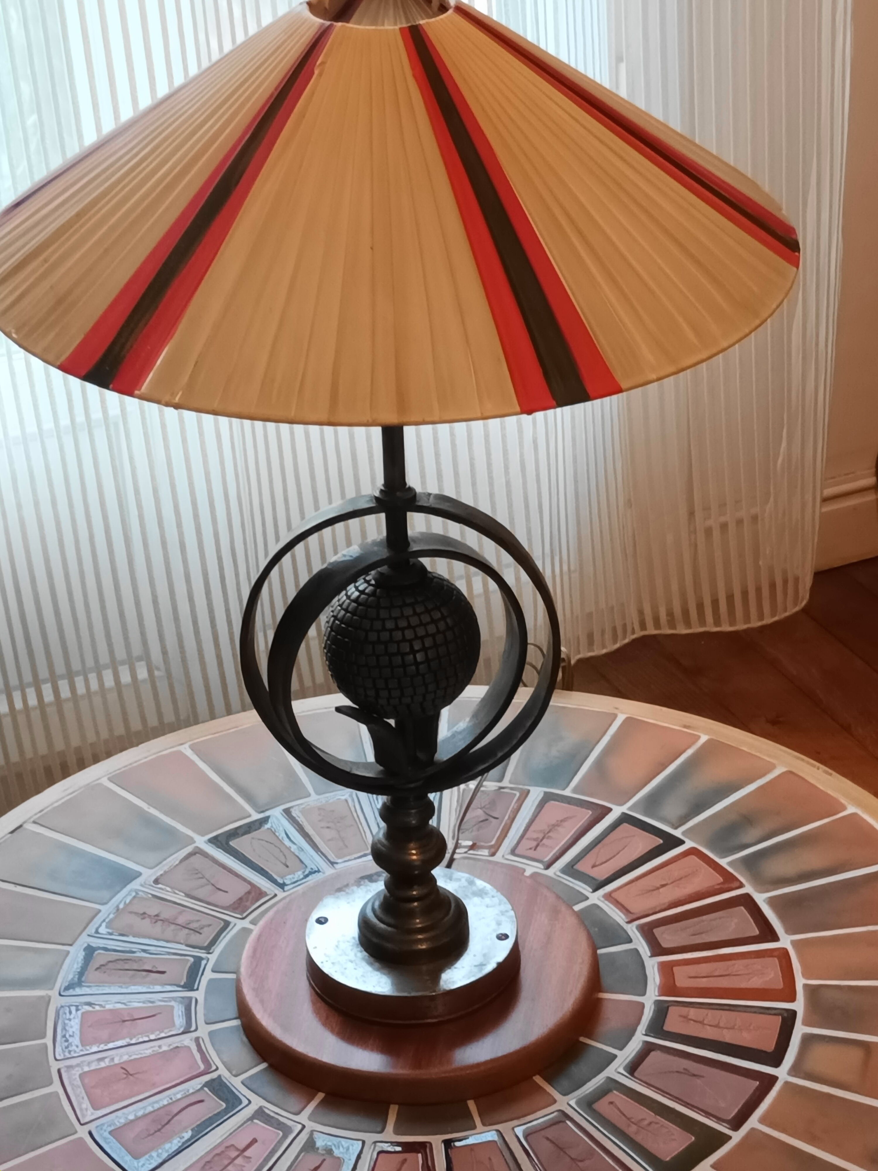 Wrought iron lamp with armillary sphere decorations