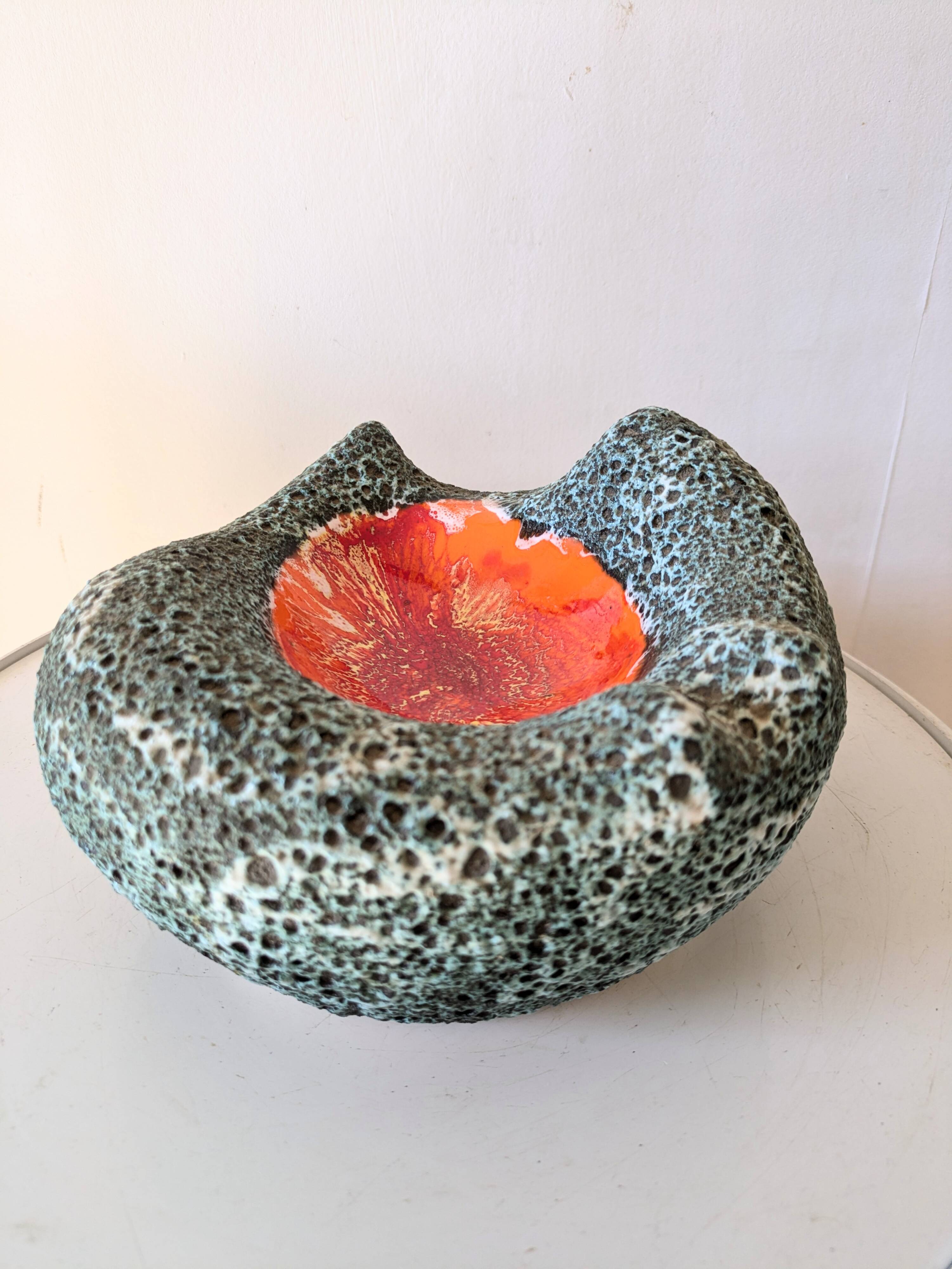 Volcanic lava pocket emptier, 70s design