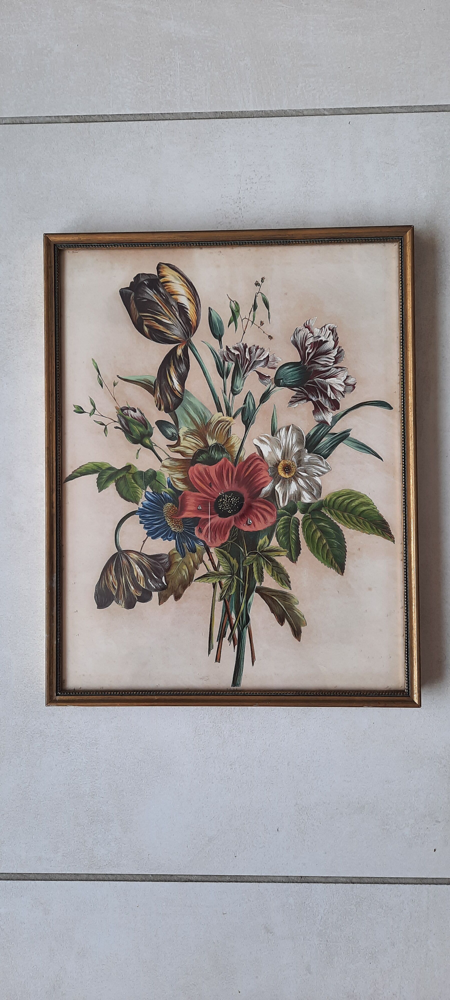 Old golden frame with floral bouquet