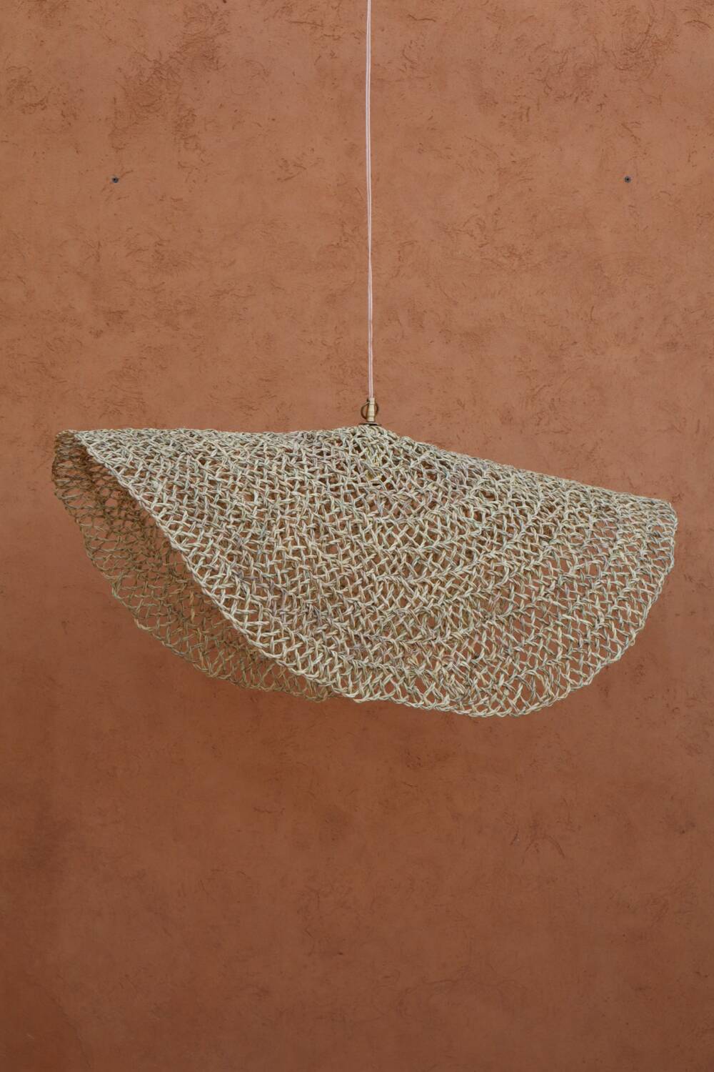 Handmade wicker hanging basket with brass finish