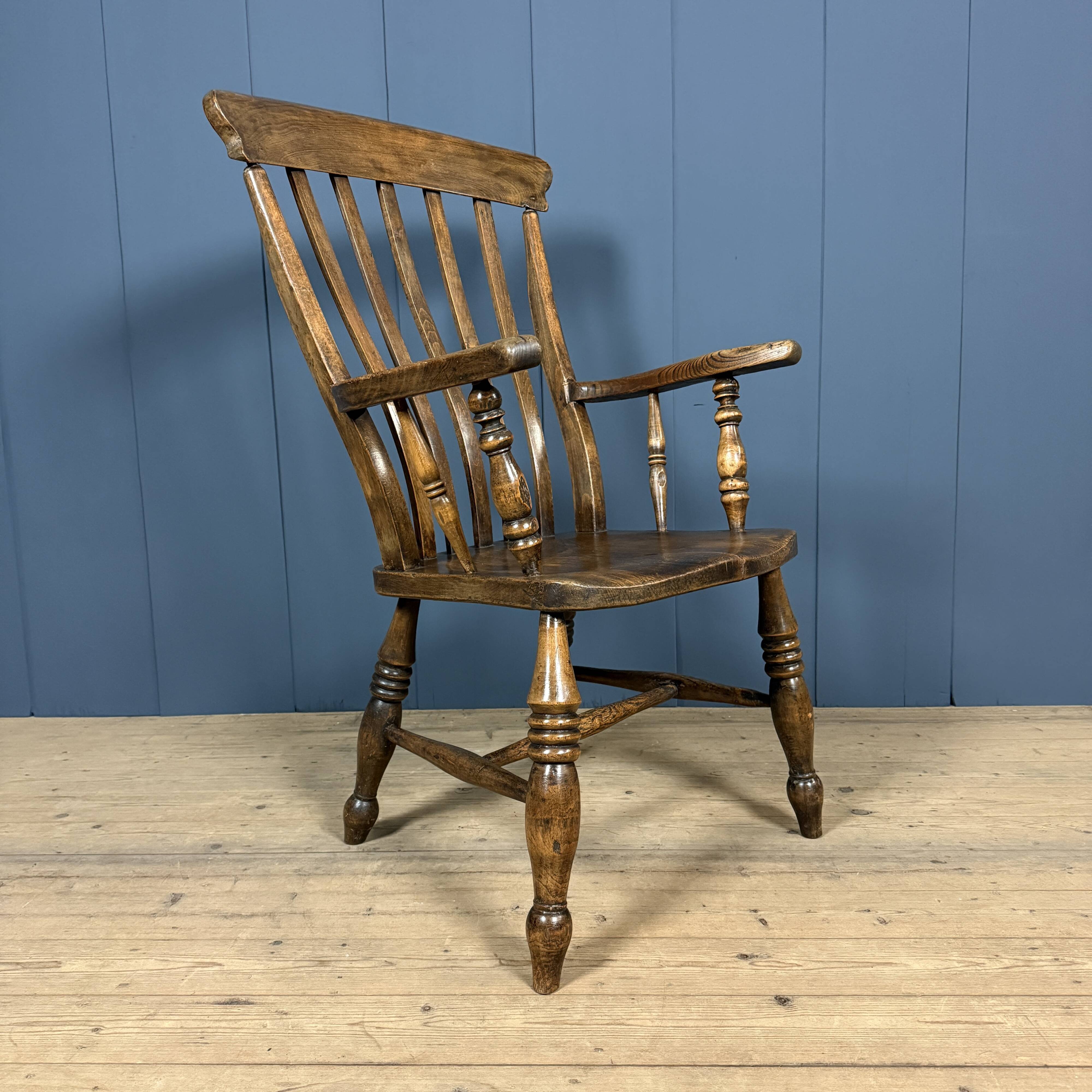 Brown English Windsor armchair with high back