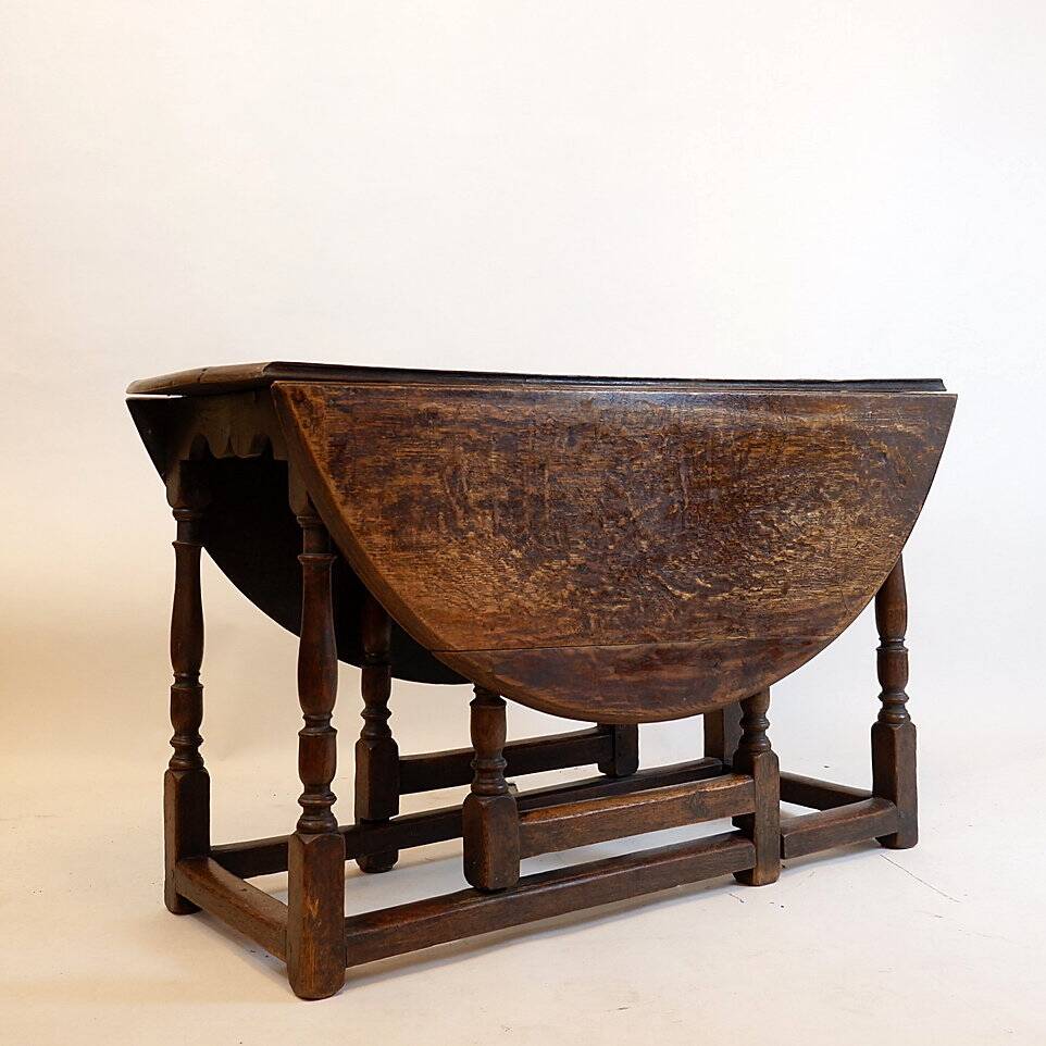19th century English drop-leaf table with turned legs
