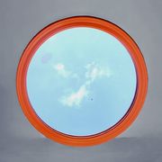 Vintage round wall mirror in orange painted wood - diameter: 48 cm
