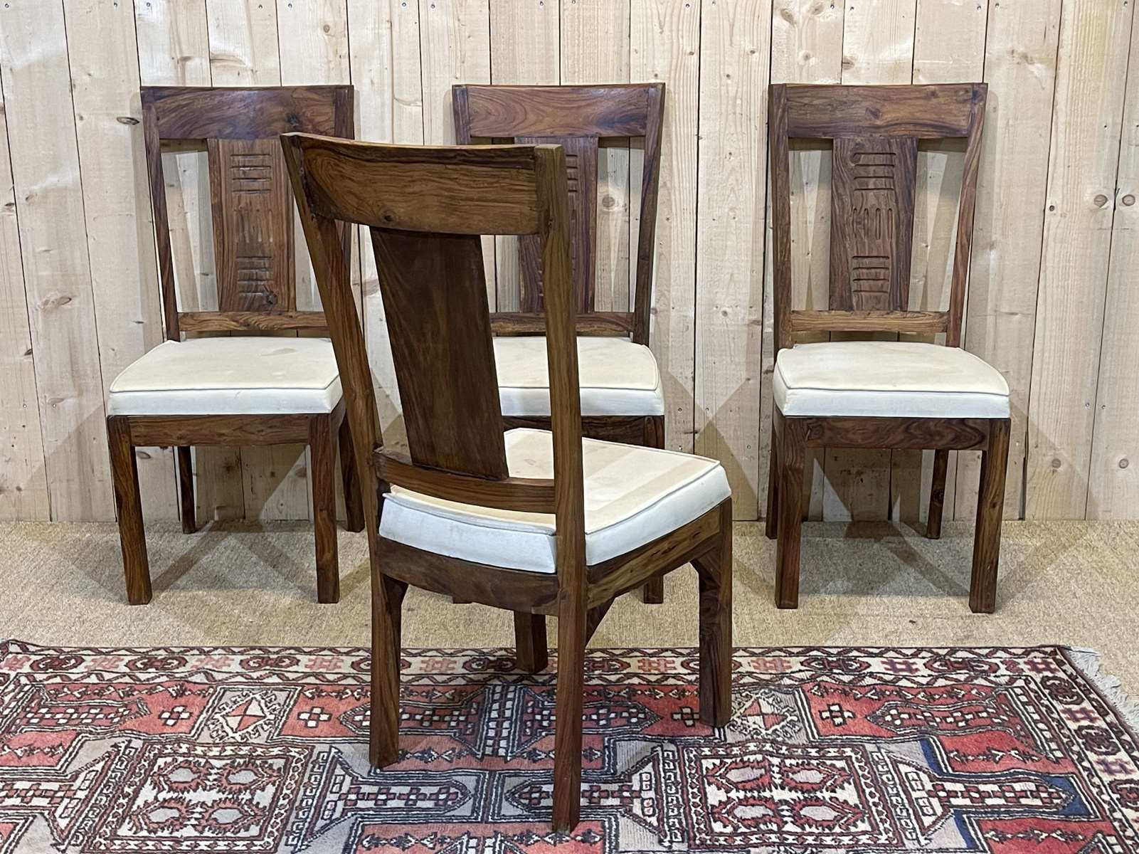 Suite of 4 teak chairs, Indian manufacture of the 1980s