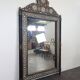 Orientalist mirror with bone inlays and hard stone cabochons.