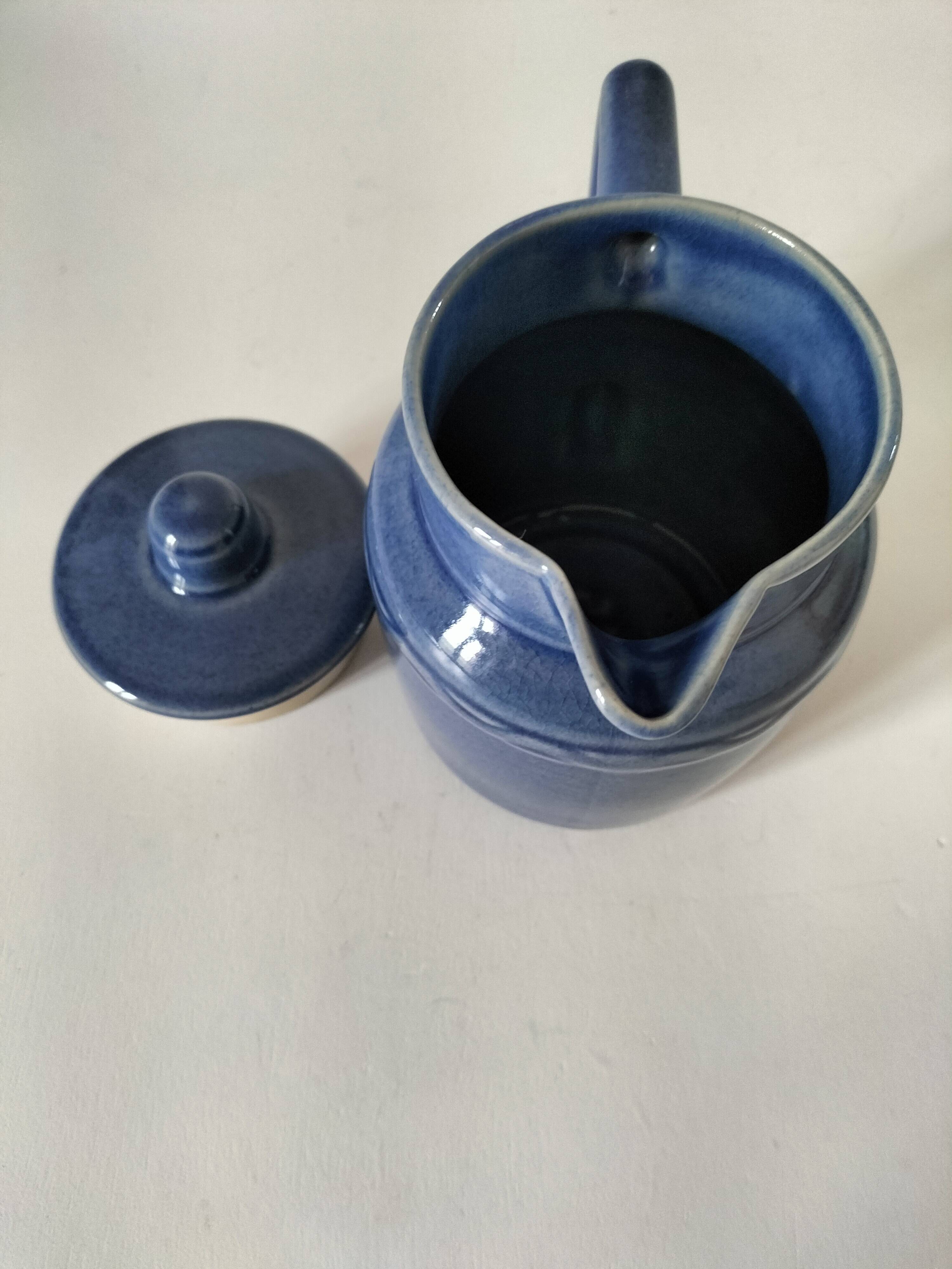 Blue speckled stoneware jug with integrated filter