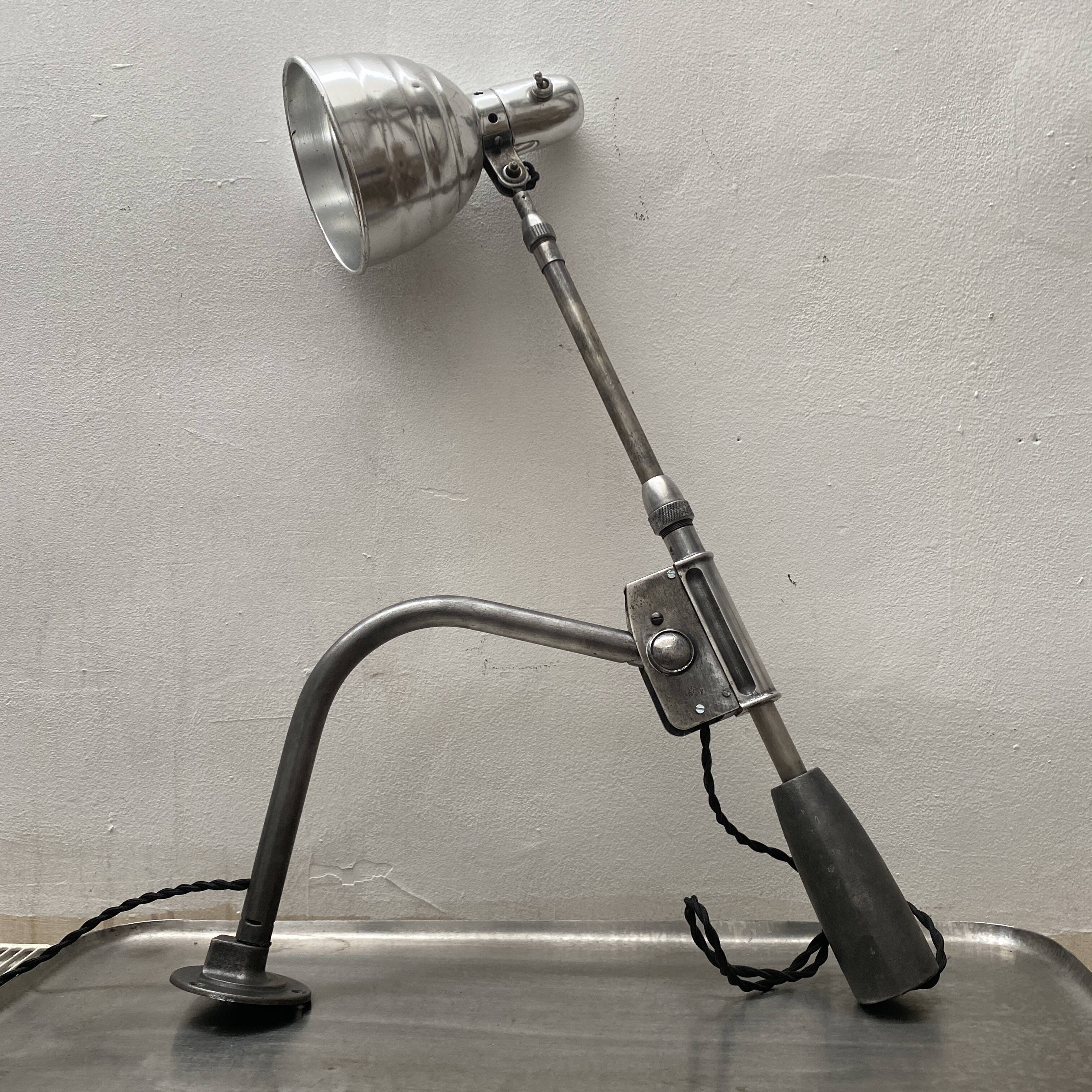 Old industrial wall light with counterweight.