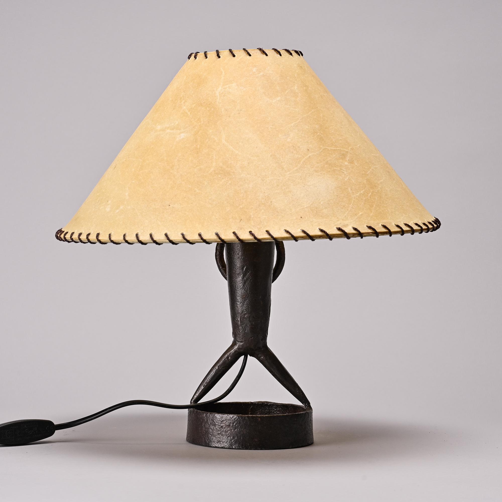 Table lamp in hammered iron by Léopold Gest, France, circa 1970.
