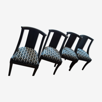 series of 4 black gondola chairs