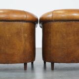 Set of 2 sheep leather club chairs in a cognac color