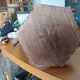 Vintage tripod stool in carved solid wood.