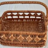 Old wicker basket with diamond-shaped decorations