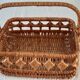 Old wicker basket with diamond-shaped decorations