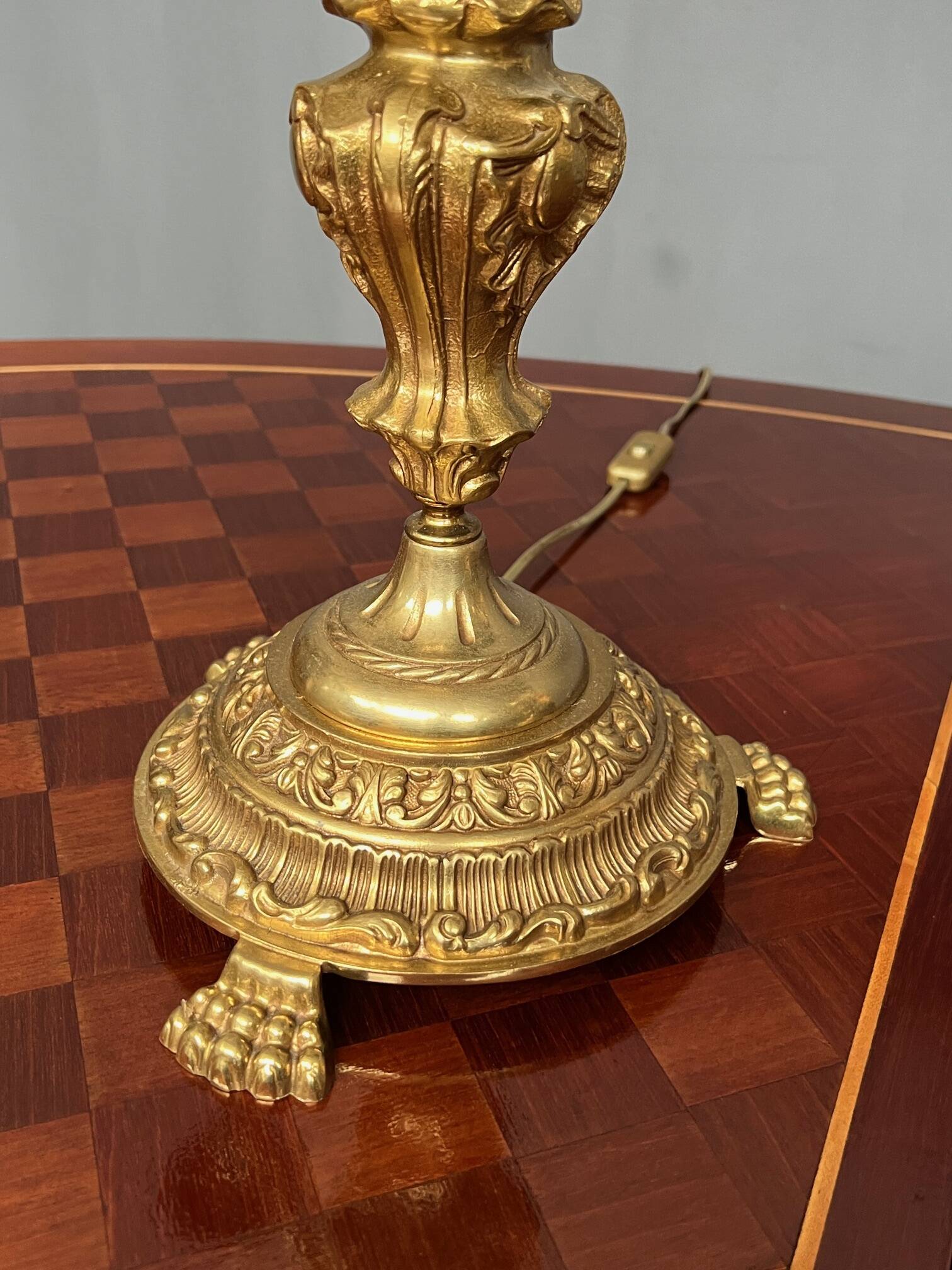 Luxurious pair of antique gilded bronze candelabra in the exquisite style of Louis XV.