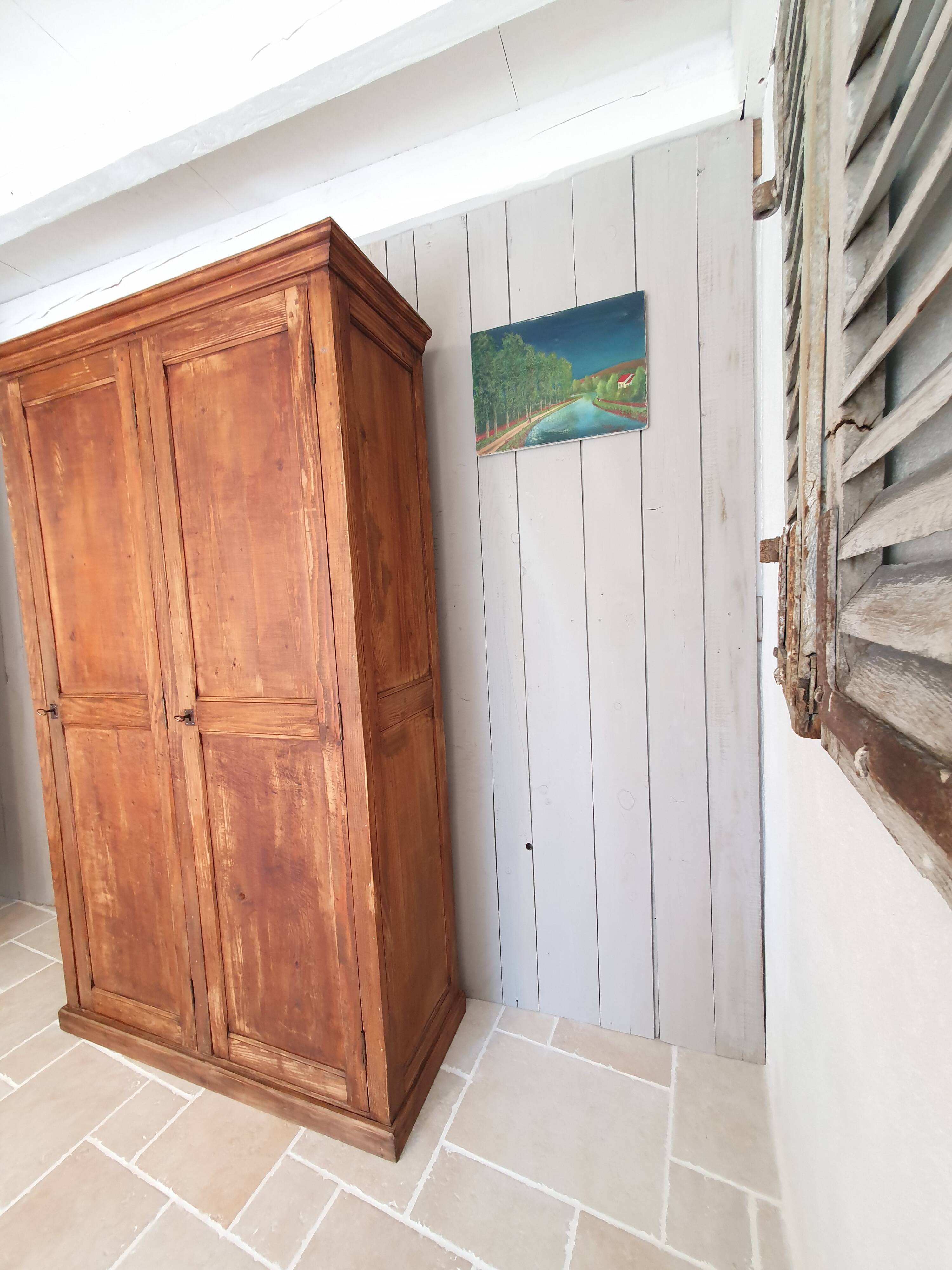 Parisian wardrobe in raw wood