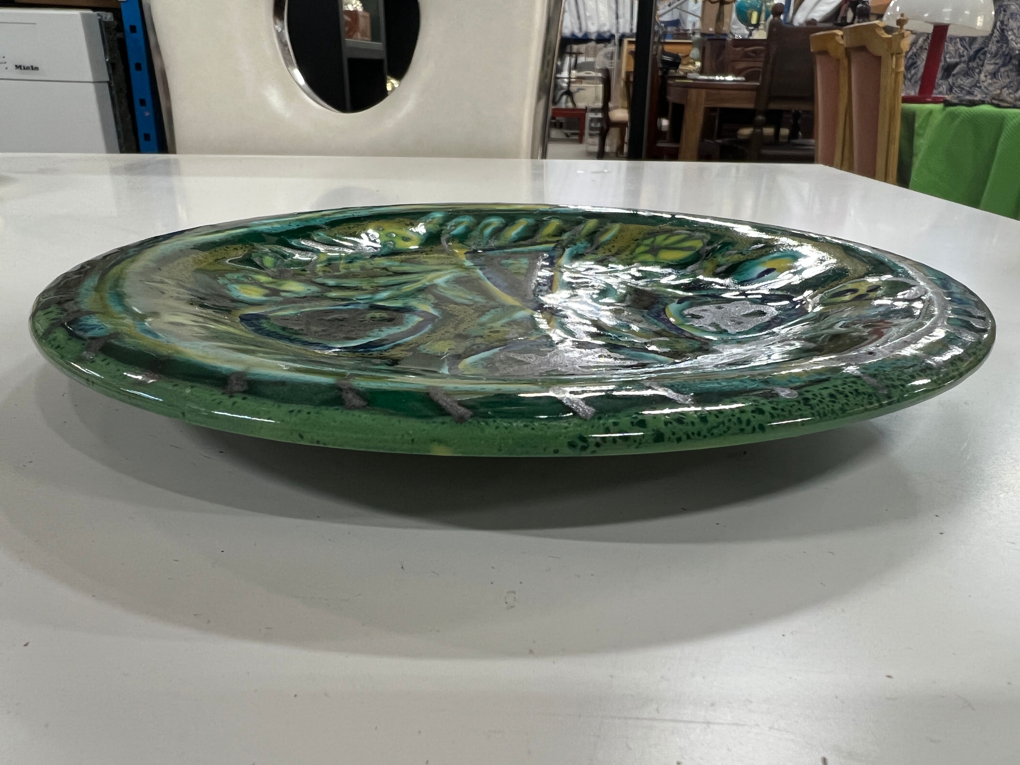 Ceramic plate signed Paul Yvain