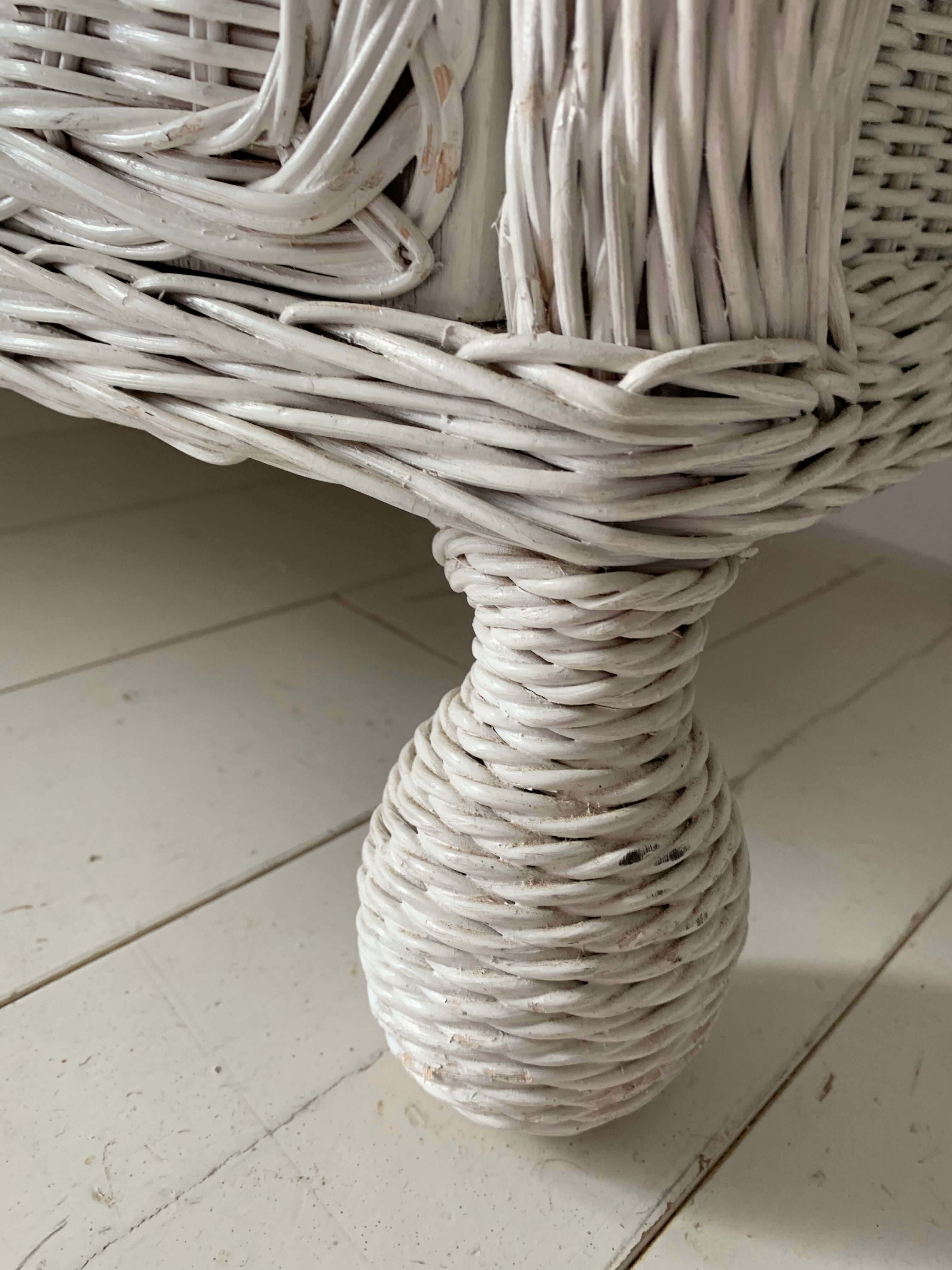 White dresser in vintage rattan