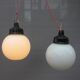 Trio suspensions globes verre opalin et bakélite