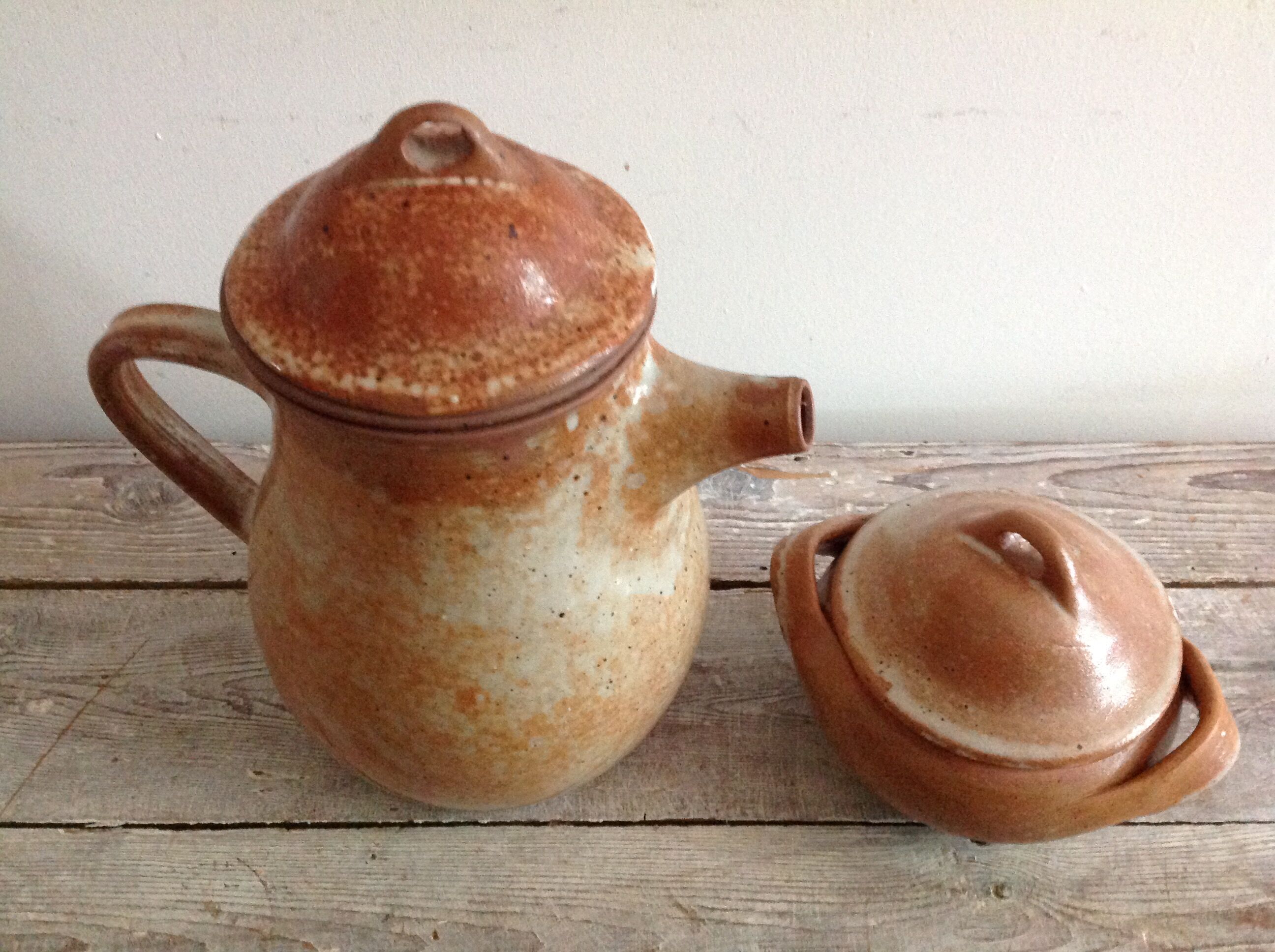 Teapot in reeds and its sugar bowl