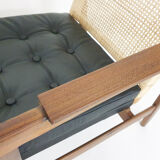 Rattan and leather low-back lounge chair by P.J. Muntendam for Gebr. Jonkers, The Netherlands 1950's