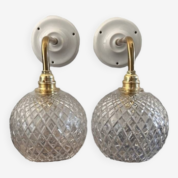 Pair of chiseled glass sconces