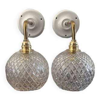 Pair of chiseled glass sconces