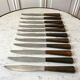 Lot de 11 couteaux à dents en bois années 50