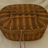Old padded interior wicker box.