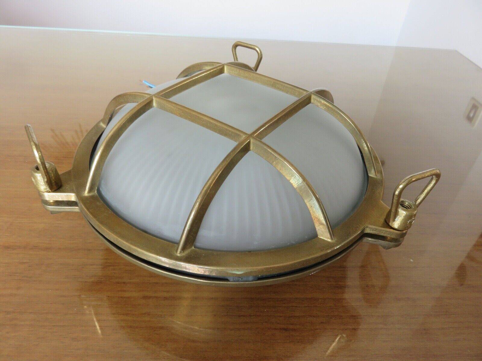 Brass porthole wall lamp
