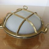 Brass porthole wall lamp