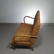 Vintage French papercord sofa with a metal frame base