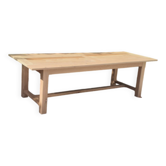 Large solid oak farmhouse table in raw wood