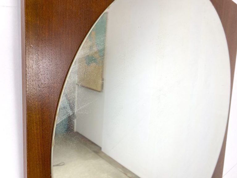 Retro mirror on wood
