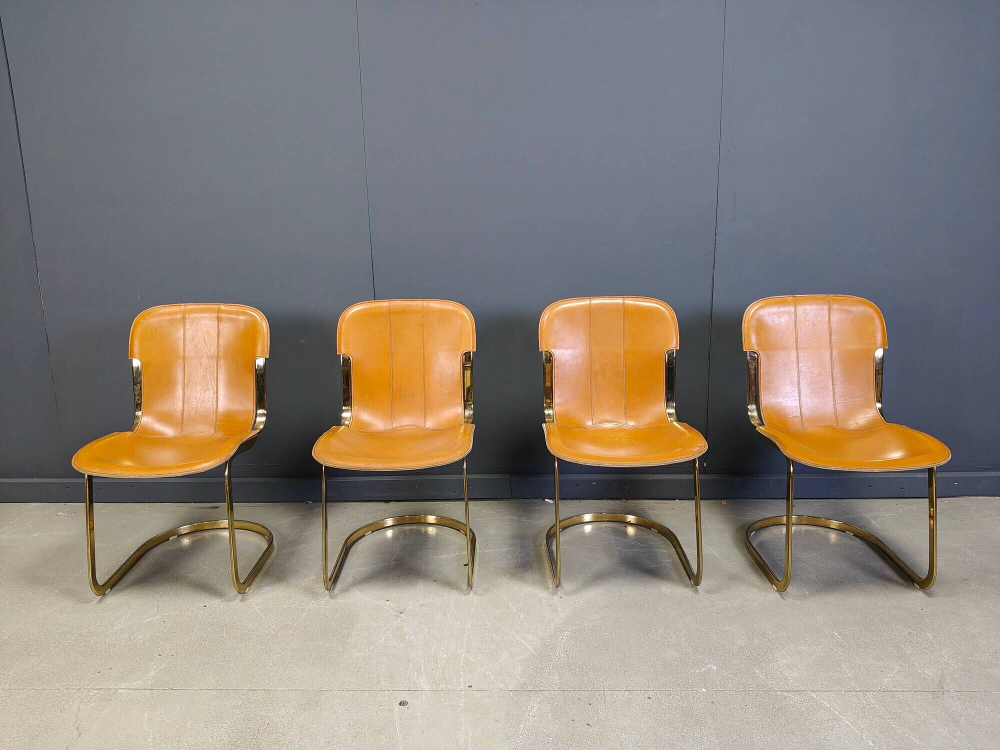Vintage brass and cognac leather dining chairs by Willy Rizzo for Cidue set of 4
