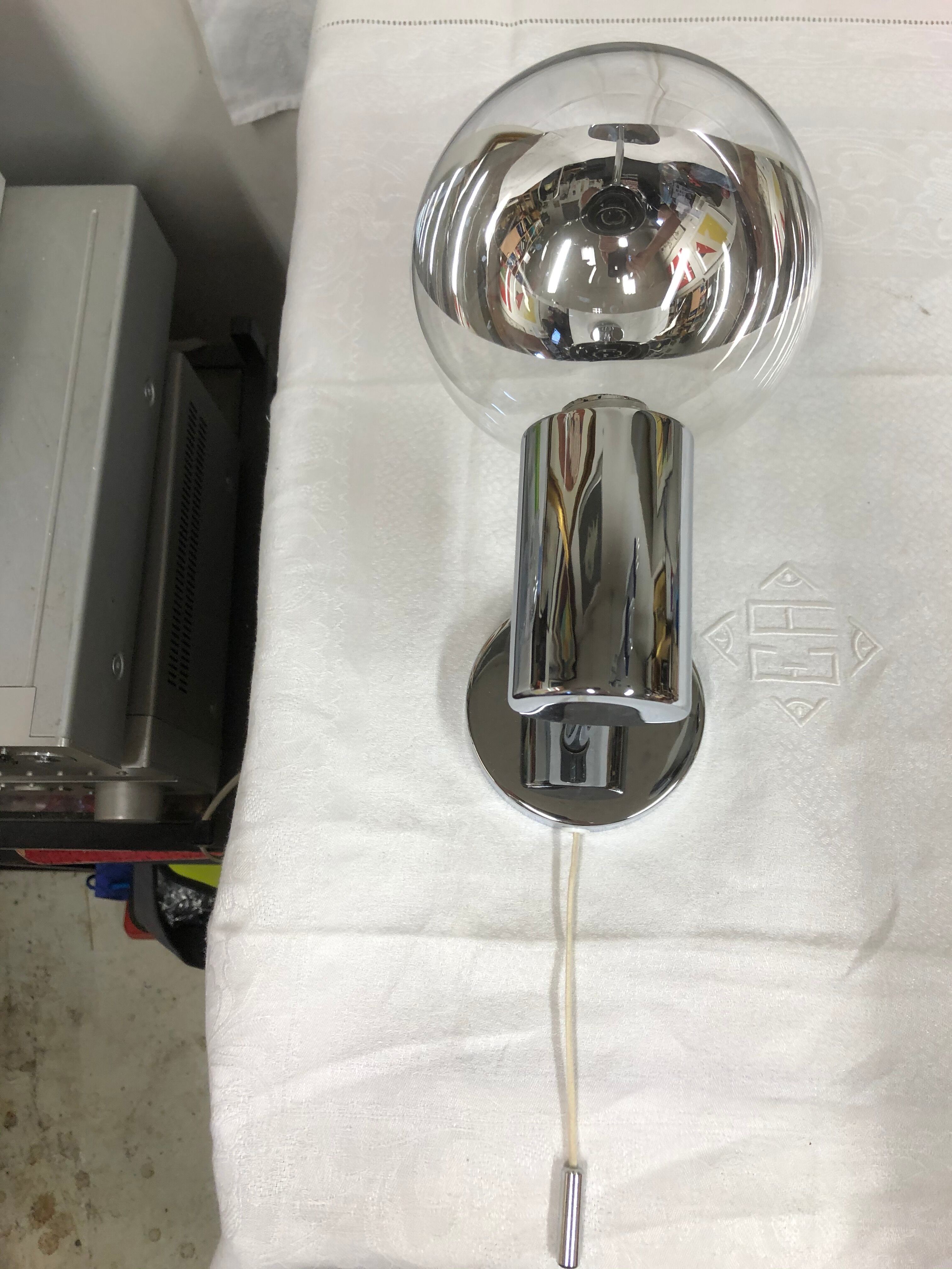 Motoko Ishii's eclipse wall light for Staff