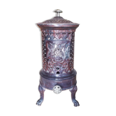 Old compact wood stove in enamelled cast iron with tripod feet with Lion's legs