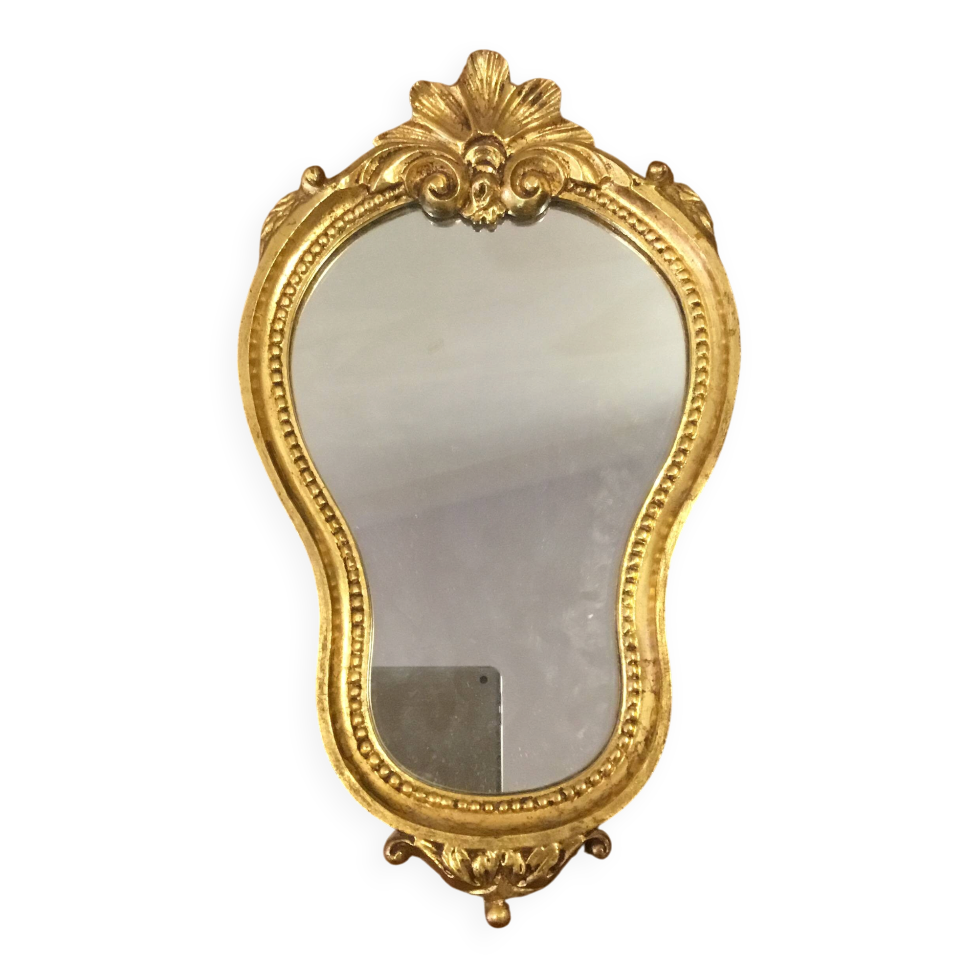 Golden wooden mirror in baroque style