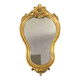 Golden wooden mirror in baroque style