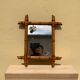 Vintage bamboo mirror in light wood bohemian decoration