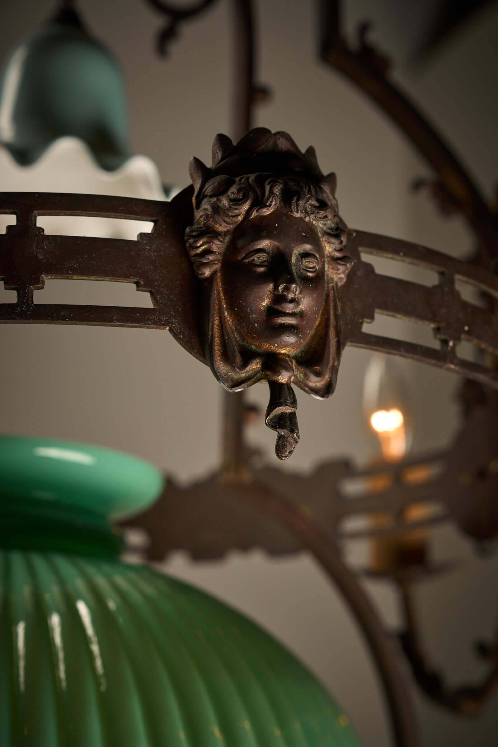 Antique adjustable height chandelier with original glasswork and brass detailing