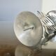 Ethnic “skeleton” candle holder in nickel-plated brass from the 80s