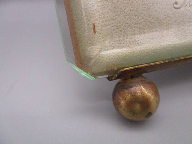 Old frame in brass and beveled glass