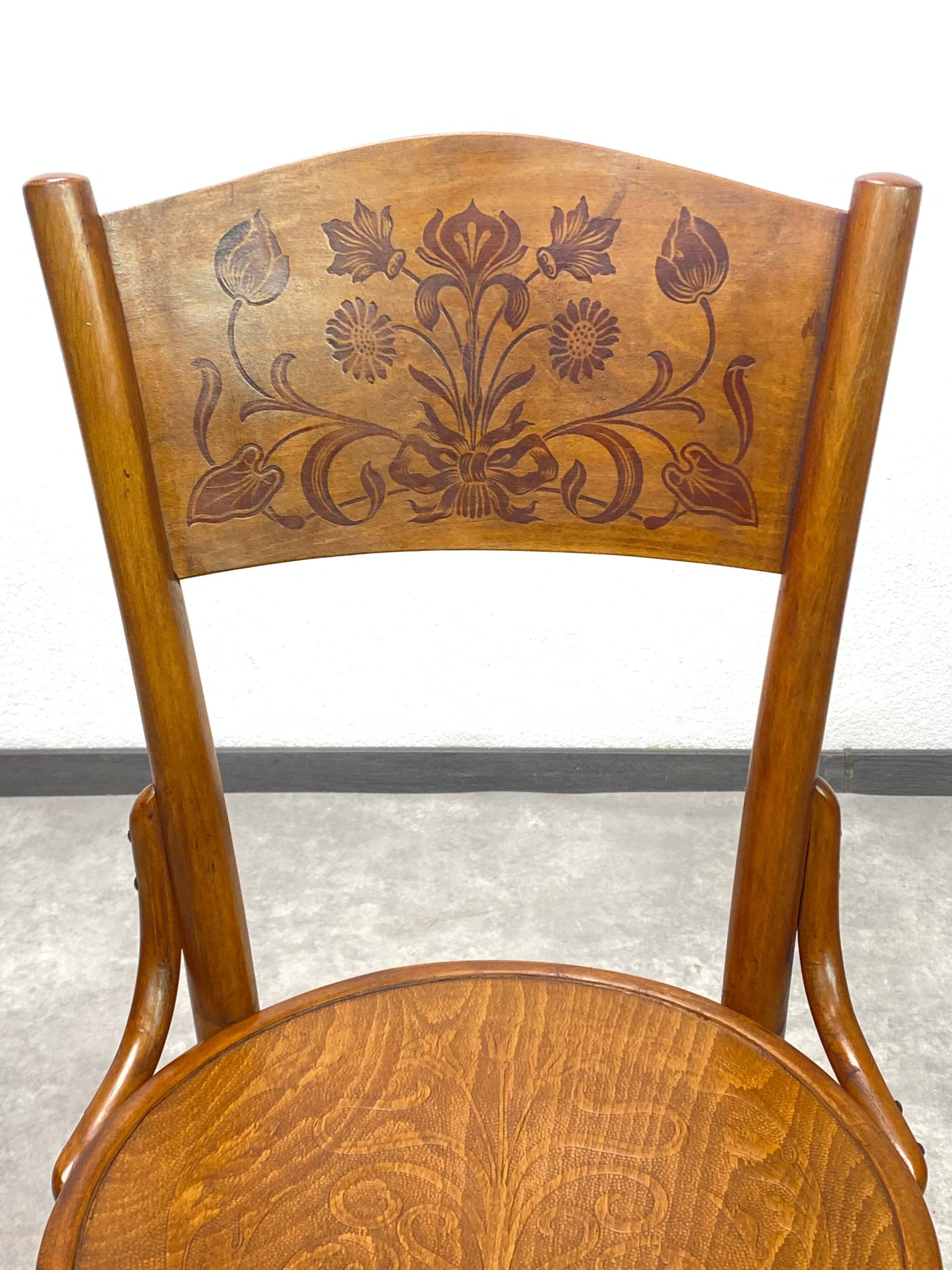 Set of 4 dining chairs by Thonet Mundus