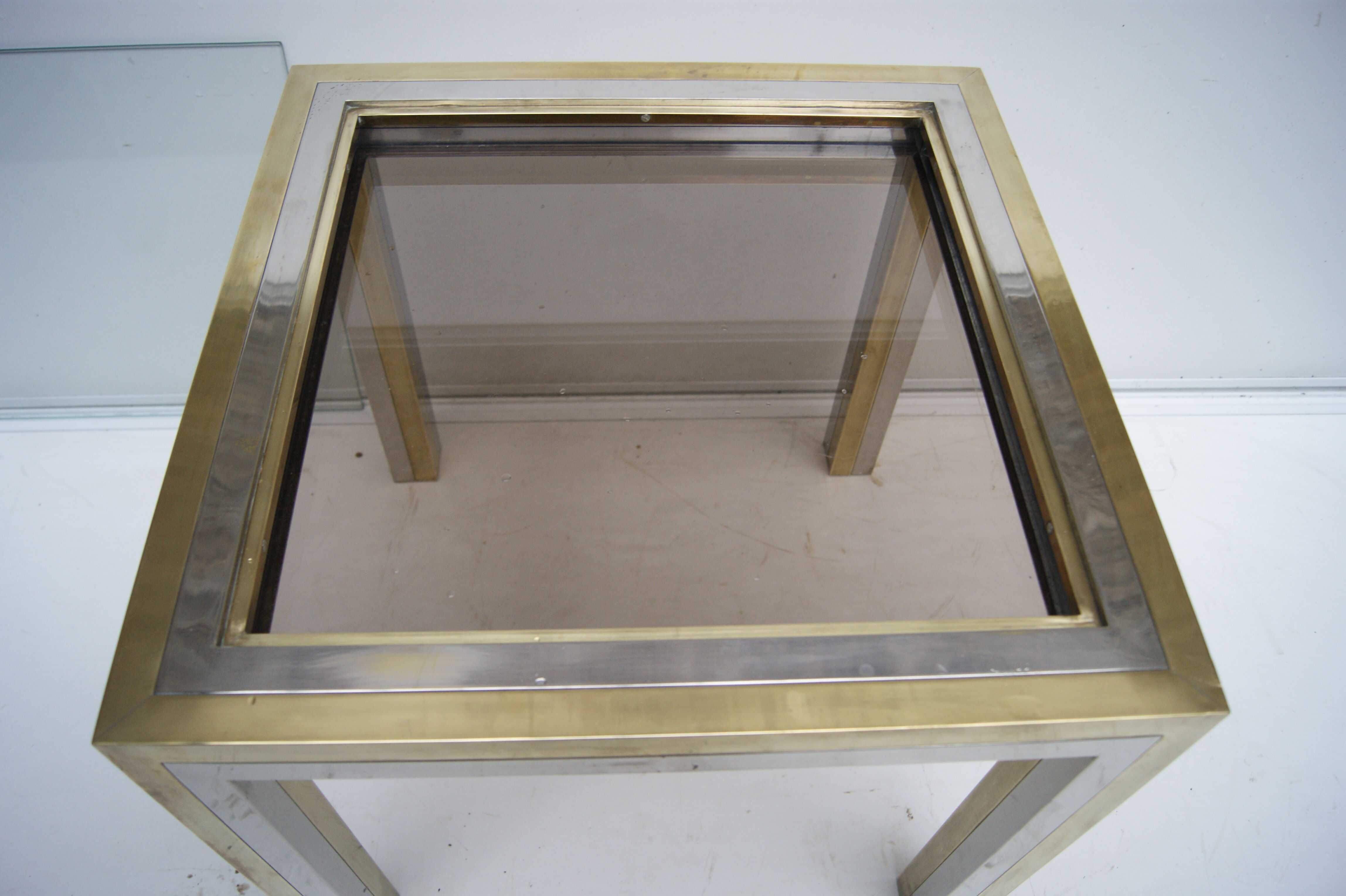 Piece of sofa coffee table brass chrome, brass. 2 glass trays. Italy 1970's