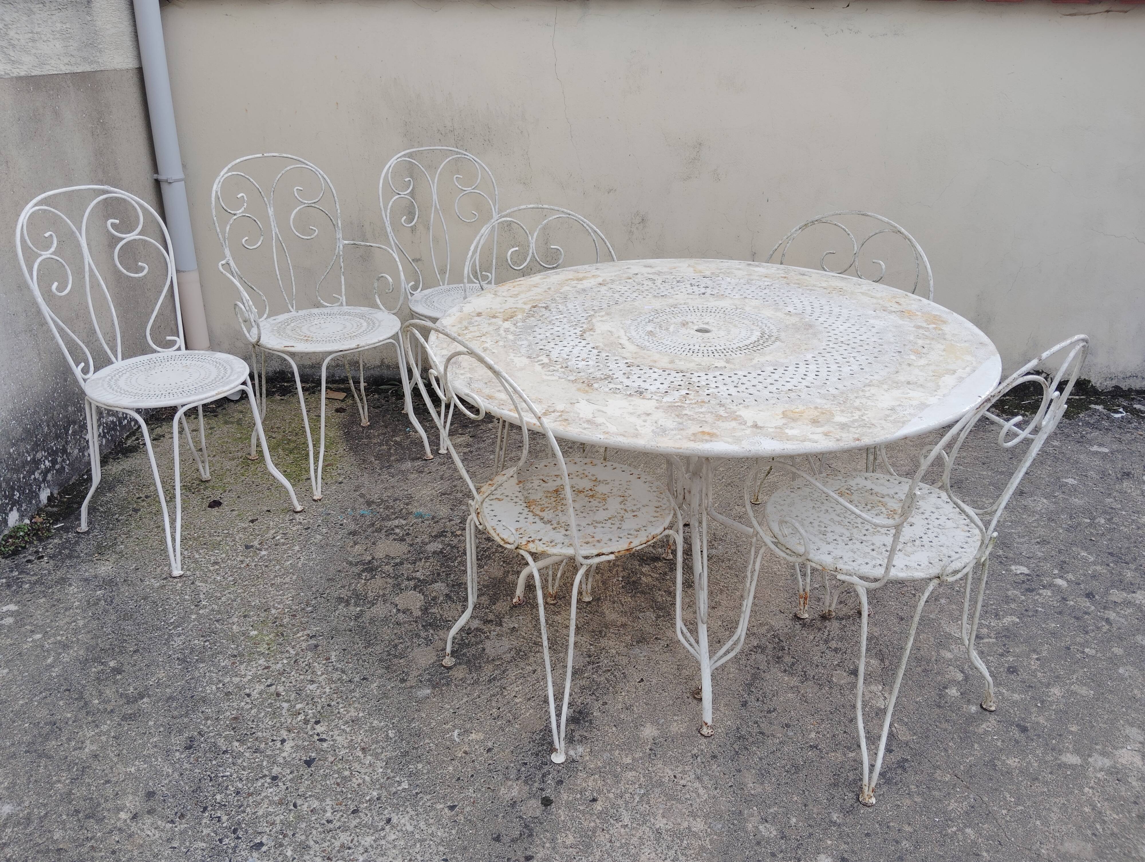 Wrought iron garden furniture from the early 20th century.
