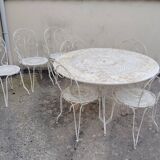 Wrought iron garden furniture from the early 20th century.