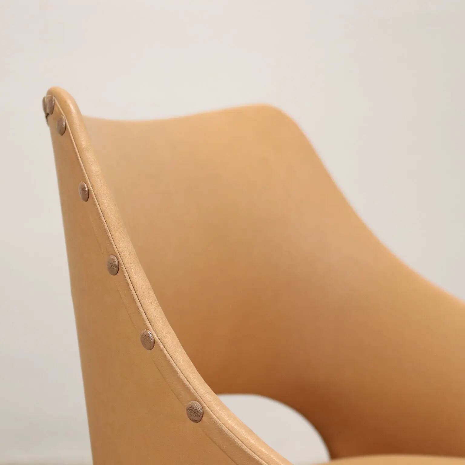 Pair of vintage armchairs from the 50s-60s in ebony wood, brass, with padded seats.