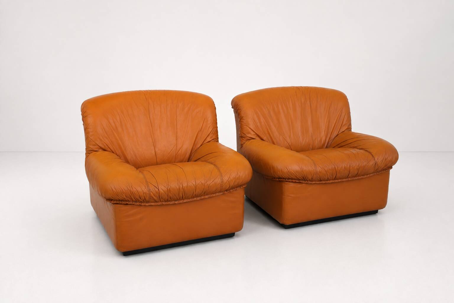 1970’s Vintage cognac leather lounge chairs ‘Giusy’ from Neoflex, Italy