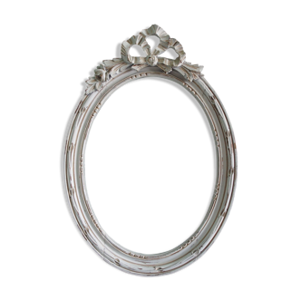 Wooden oval frame with Louis XVI-style knot