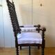 Fauteuil à haut dossier de style Louis XIII